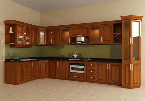 Với kiểu dáng chữ L tối ưu hóa không gian bếp, tủ sẽ tạo cảm giác rộng rãi và tiện nghi hơn. Chất liệu gỗ xoan đào cao cấp cùng với thiết kế độc đáo chắc chắn sẽ làm hài lòng khách hàng khó tính nhất.