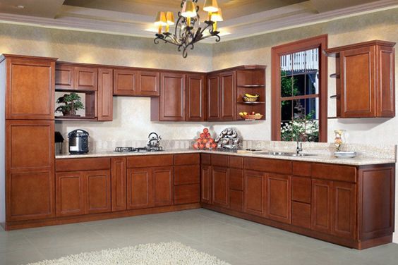 Mẫu tủ bếp gỗ hương cho nhà phố tham khảo